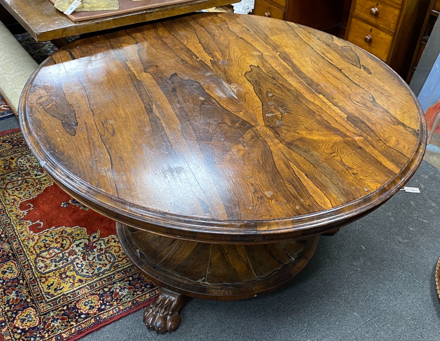 An early Victorian circular rosewood tilt top breakfast table, diameter 130cm, height 69cm